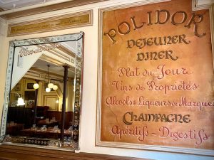 Mirror and old menu at Polidor, historic restaurant in Paris